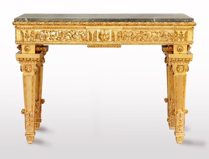 An Italian neoclassical carved and gilded wood console table, with a rectangular Verde Alpi marble top. | MasterArt